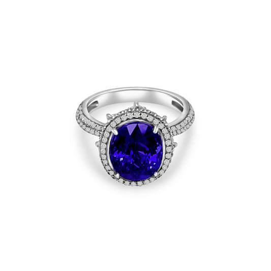 Oval Tanzanite and Halo Diamond Ring - 4.90ct Tanzanite Center Stone Exquisite Gemstone Jewelry - Oval Tanzanite with Diamond Halo Sophisticated Tanzanite and Diamond Ring - Blue-violet Oval Gemstone Halo Diamond Ring - 4.90ct Oval Tanzanite Centerpiece Elegant Tanzanite and Diamond Ring - Dazzling Gemstone Jewelry Glamorous Oval Tanzanite Ring - Sparkling Diamond Accents Special Occasion Accessory - 4.90ct Oval Tanzanite and Diamond Halo Unique Gemstone Jewelry - Brilliant Blue-violet Tanzanite Ring