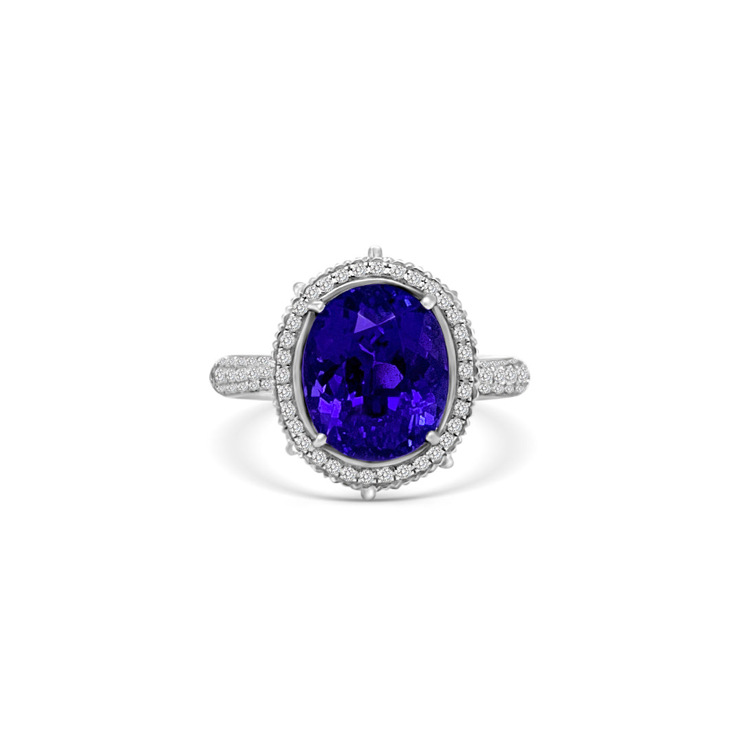Oval Tanzanite and Halo Diamond Ring - 4.90ct Tanzanite Center Stone Exquisite Gemstone Jewelry - Oval Tanzanite with Diamond Halo Sophisticated Tanzanite and Diamond Ring - Blue-violet Oval Gemstone Halo Diamond Ring - 4.90ct Oval Tanzanite Centerpiece Elegant Tanzanite and Diamond Ring - Dazzling Gemstone Jewelry Glamorous Oval Tanzanite Ring - Sparkling Diamond Accents Special Occasion Accessory - 4.90ct Oval Tanzanite and Diamond Halo Unique Gemstone Jewelry - Brilliant Blue-violet Tanzanite Ring