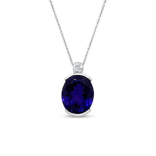 Oval Tanzanite & Diamond Pendant, Tanzanite Jewelry, Gemstone Necklace, Diamond Accent, Elegant Pendant, Precious Stone Pendant, Fine Jewelry, Oval Gemstone Pendant, Luxurious Necklace, Sparkling Diamond Pendant.
