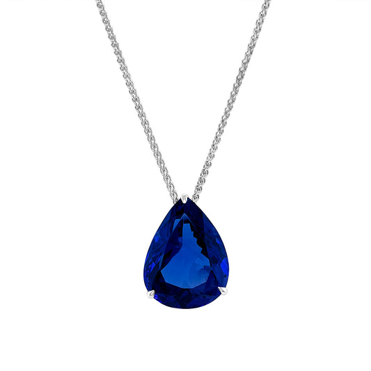 "Floating Pear-Shaped Tanzanite Pendant" "20.10ct Tanzanite Gemstone Pendant" "Luxurious Purple Tanzanite Necklace" "Elegant Pear-Cut Tanzanite Jewelry" "Delicate Chain Pendant with Tanzanite" "Exquisite Craftsmanship Tanzanite Necklace" "Statement Gemstone Necklace" "Vivid Purple and Violet Tanzanite Pendant" "Pear-Shaped Tanzanite Suspended Pendant" "Timeless and Opulent Tanzanite Jewelry"