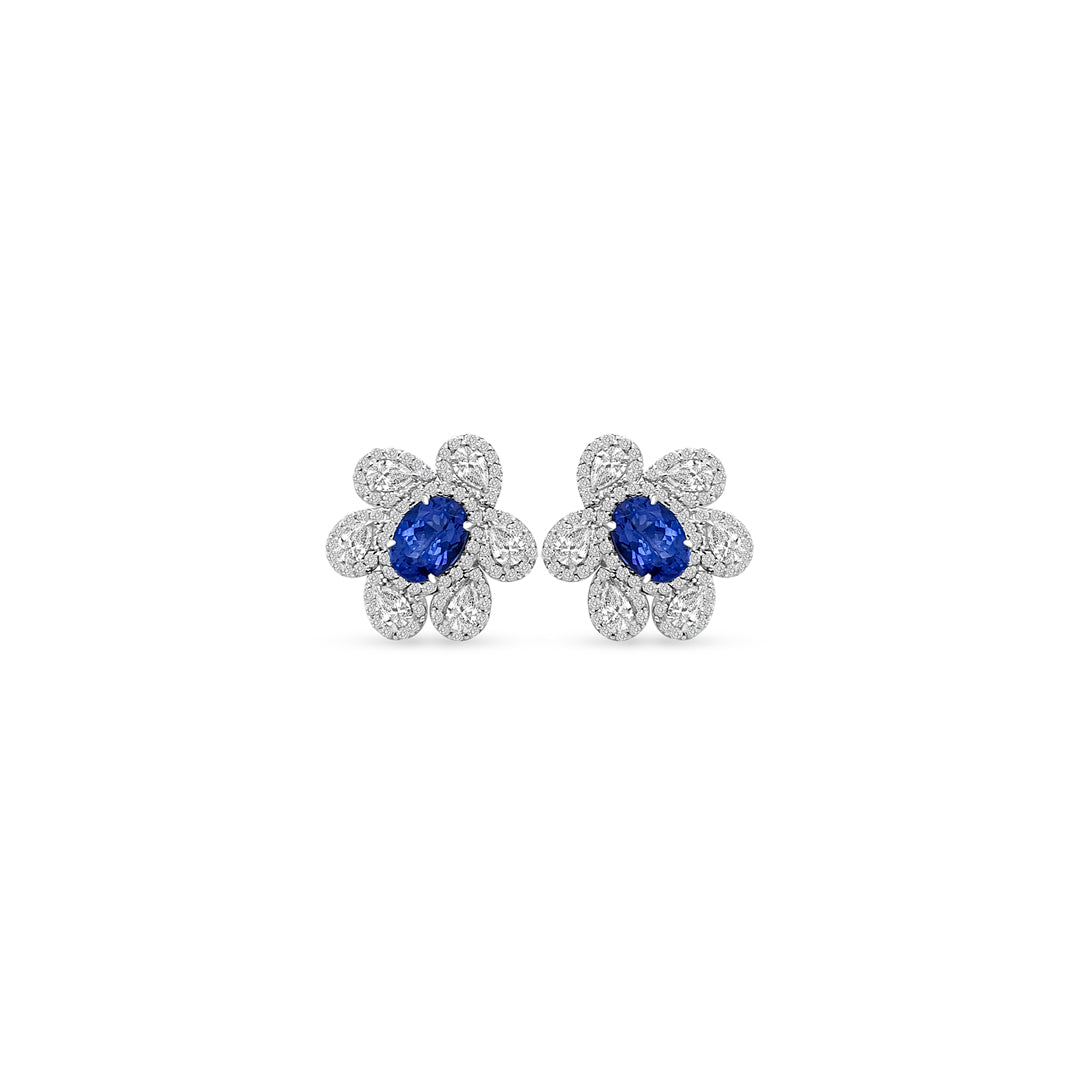 Main Image: "1.60ct Oval Tanzanite & Multi-Shape Floral Diamond Stud Earrings" Tanzanite Detail: "Vivid Oval Tanzanite Gemstone" Floral Diamond Arrangement: "Intricate Floral Diamond Design" Earring Profile: "Multi-Shape Floral Stud Earring Profile" Custom Open Liners: "Earrings with Different Open Liner Options" Timeless Elegance: "Diamond Stud Earrings with Tanzanite and Floral Design"