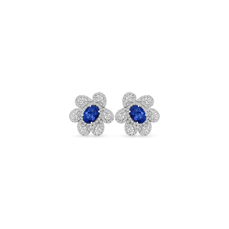 Main Image: "1.60ct Oval Tanzanite & Multi-Shape Floral Diamond Stud Earrings" Tanzanite Detail: "Vivid Oval Tanzanite Gemstone" Floral Diamond Arrangement: "Intricate Floral Diamond Design" Earring Profile: "Multi-Shape Floral Stud Earring Profile" Custom Open Liners: "Earrings with Different Open Liner Options" Timeless Elegance: "Diamond Stud Earrings with Tanzanite and Floral Design"