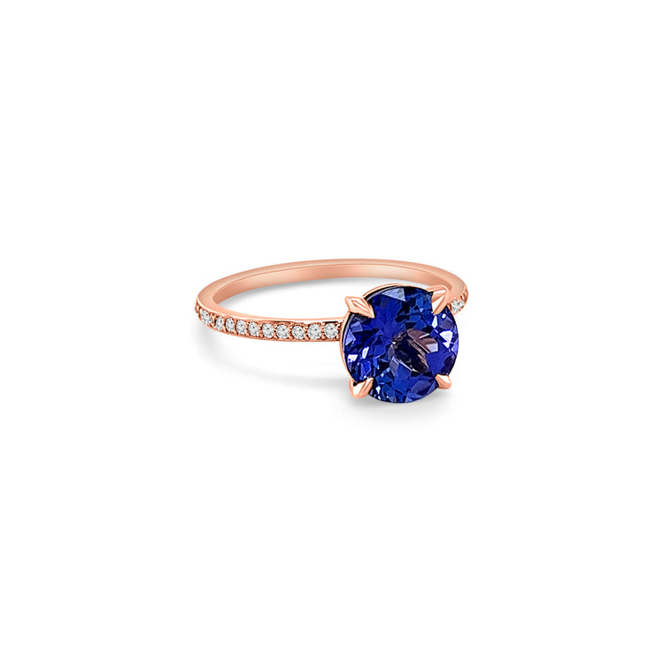 Main Image: "2.00ct Four Claw Round Tanzanite and Diamond Ring" Side View: "Round Tanzanite Gemstone Ring" Diamond Detail: "Diamond Accents on Tanzanite Ring" Elegance in Design: "Four Claw Setting with Tanzanite and Diamonds" Brilliance and Beauty: "Craftsmanship of Tanzanite and Diamond Ring"