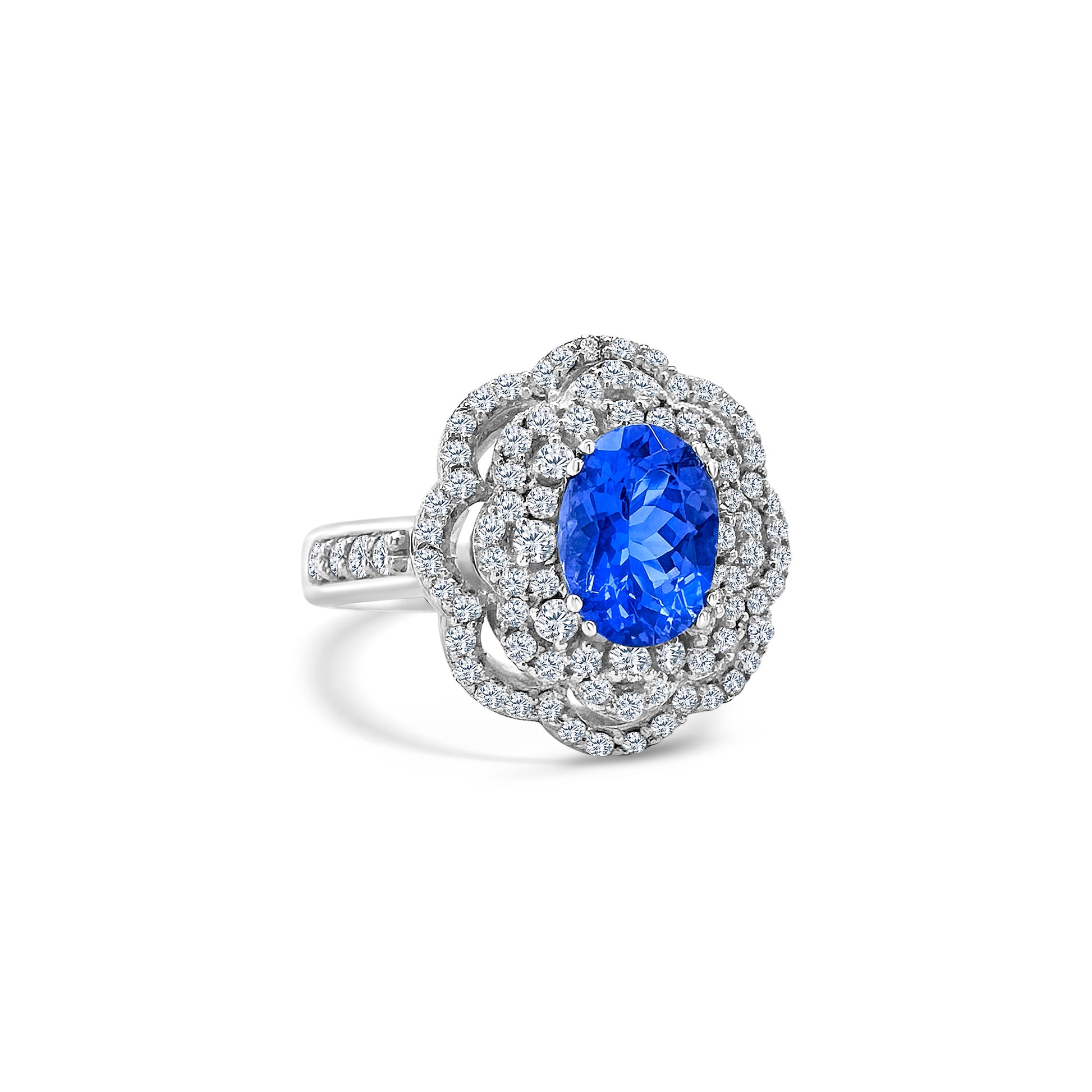 Oval Tanzanite Ring, Floral Diamond Halo Ring, Tanzanite and Diamond Jewelry, Gemstone Engagement Ring, Floral Design Ring, Halo Setting Jewelry, Oval Gemstone Ring, Tanzanite and Diamond Halo, Fine Jewelry, Luxury Ring Design
