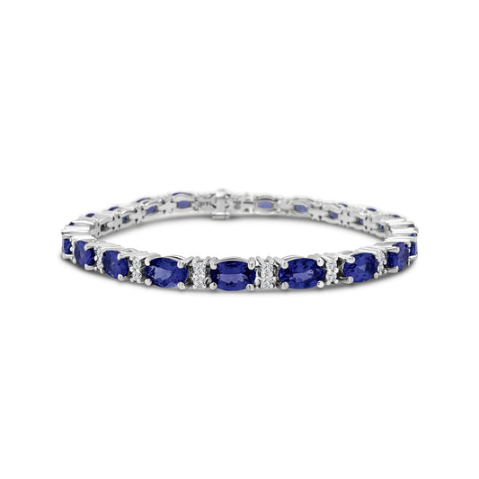 "Oval Tanzanite Bracelet, Tanzanite and Diamond Jewelry, Gemstone Diamond Bracelet, Fine Jewelry Bracelet, Elegant Gemstone Bracelet, Tanzanite and Diamond Accent Bracelet, Oval Tanzanite and Diamond Wristwear, Luxury Gemstone Jewelry, Oval Tanzanite with Diamond Accents, Stylish Gemstone Bracelet"
