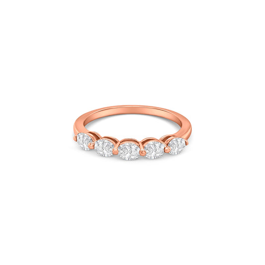 Oval cut diamond ring, half eternity band, sparkling jewelry, elegant design, luxurious accessory, timeless beauty, glamorous style, stunning craftsmanship, dazzling diamonds, exquisite detailing.