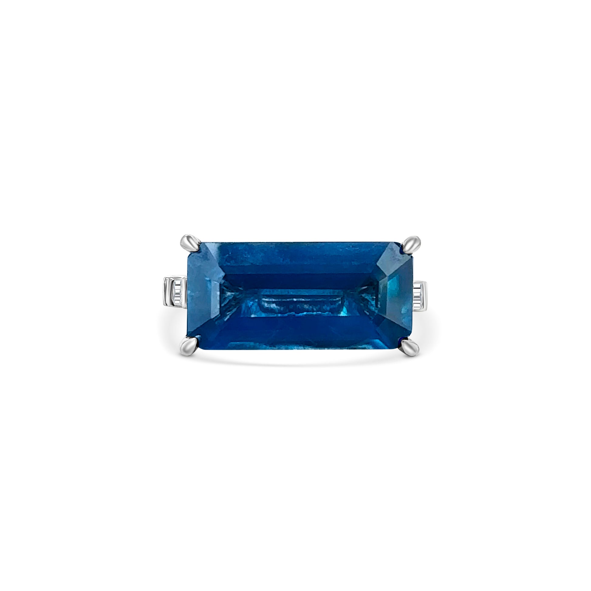 "Radiant sapphire ring, blue gemstone jewelry, sparkling diamond accents, elegant gemstone ring, luxury jewelry, statement ring, fine jewelry piece, special occasion accessory."