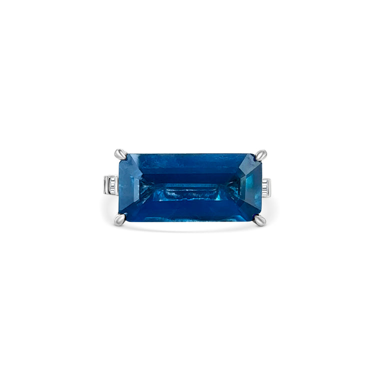 "Radiant sapphire ring, blue gemstone jewelry, sparkling diamond accents, elegant gemstone ring, luxury jewelry, statement ring, fine jewelry piece, special occasion accessory."