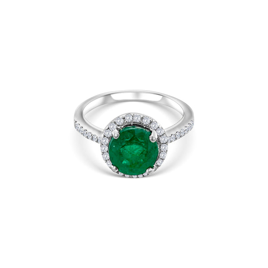 Round emerald diamond halo ring, green gemstone engagement band, elegant emerald jewelry, sparkling diamond accents, luxurious halo setting, fine jewelry gift for her.