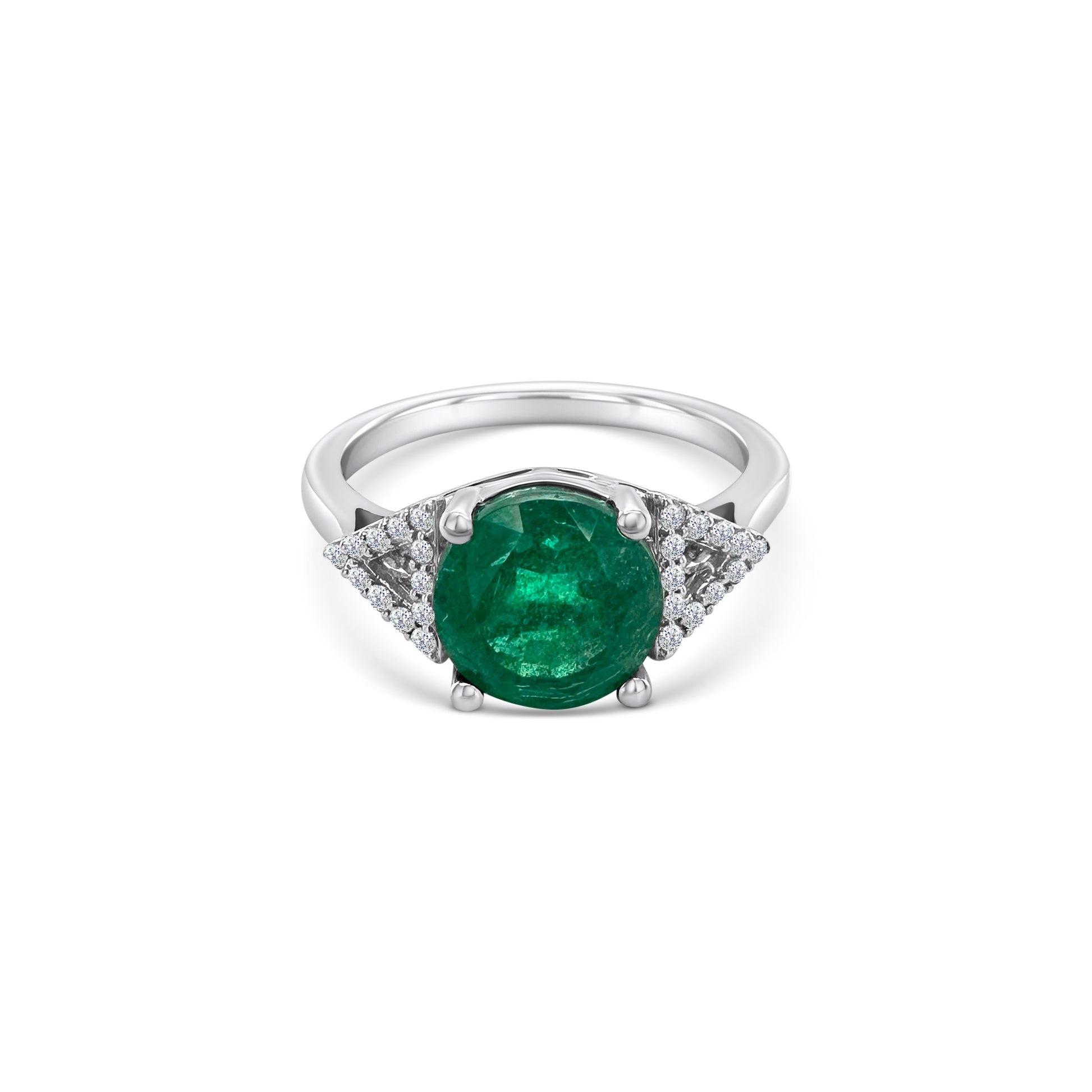 A round emerald & diamond halo ring, exquisite emerald and diamond ring, stunning emerald and diamond jewelry, elegant emerald and diamond engagement ring, beautiful emerald and diamond cocktail ring, luxurious emerald and diamond statement piece, captivating emerald and diamond accessory.