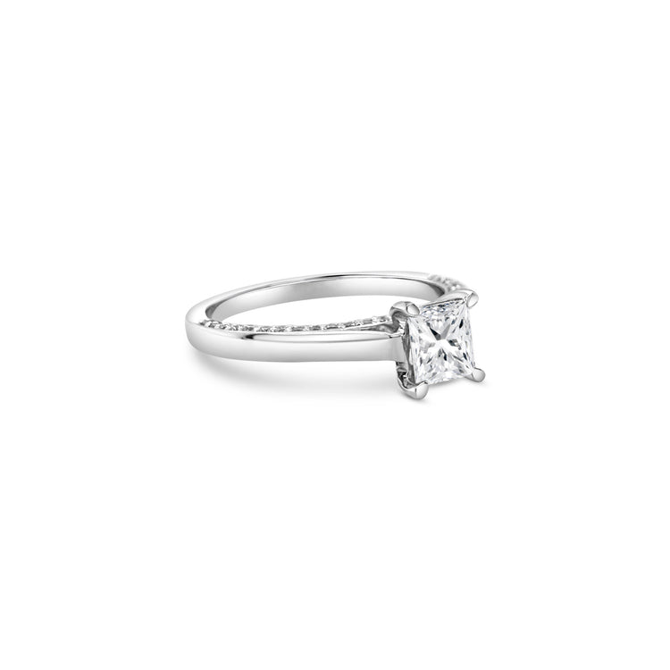 "A stunning cushion-cut diamond ring," "a luxurious solitaire engagement ring," "a sparkling diamond ring for special occasions," "an elegant cushion-cut solitaire ring," "a timeless diamond ring design," "a classic cushion-cut diamond engagement ring."