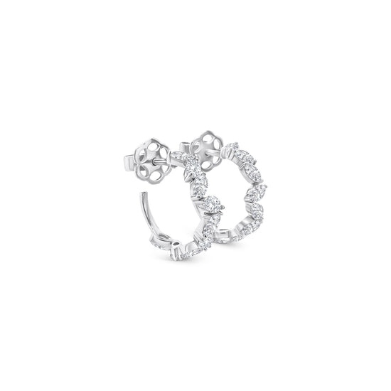Oval cut diamond hoop earrings, elegant oval diamond hoops, sparkling oval diamond earrings, luxury diamond hoop earrings, oval diamond jewelry, fine diamond hoop earrings, oval cut diamond accessories, glamorous diamond hoop earrings, oval diamond ear hoops, sophisticated oval diamond earrings, timeless oval cut diamond hoops, stylish diamond hoop earrings, exquisite oval diamond earrings, high-end oval diamond hoops, fashionable oval cut diamond earrings.