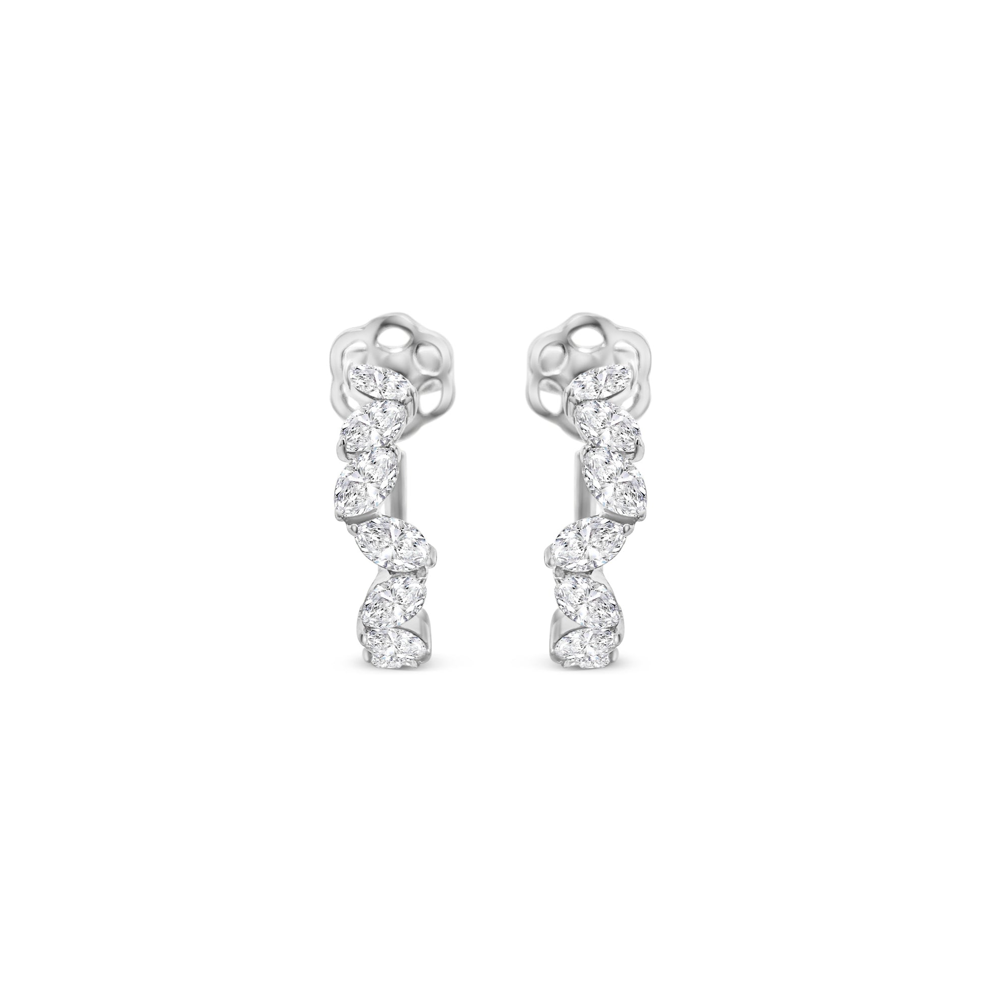 Oval cut diamond hoop earrings, elegant oval diamond hoops, sparkling oval diamond earrings, luxury diamond hoop earrings, oval diamond jewelry, fine diamond hoop earrings, oval cut diamond accessories, glamorous diamond hoop earrings, oval diamond ear hoops, sophisticated oval diamond earrings, timeless oval cut diamond hoops, stylish diamond hoop earrings, exquisite oval diamond earrings, high-end oval diamond hoops, fashionable oval cut diamond earrings.