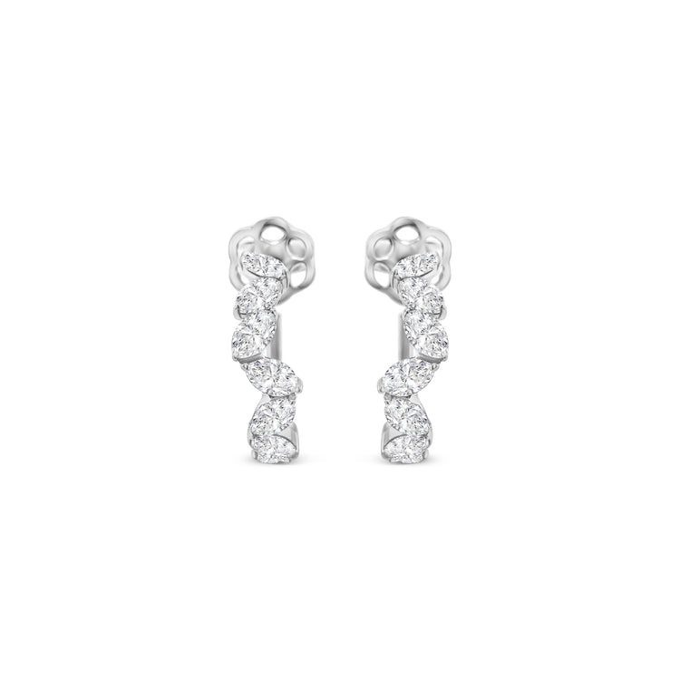 Oval cut diamond hoop earrings, elegant oval diamond hoops, sparkling oval diamond earrings, luxury diamond hoop earrings, oval diamond jewelry, fine diamond hoop earrings, oval cut diamond accessories, glamorous diamond hoop earrings, oval diamond ear hoops, sophisticated oval diamond earrings, timeless oval cut diamond hoops, stylish diamond hoop earrings, exquisite oval diamond earrings, high-end oval diamond hoops, fashionable oval cut diamond earrings.