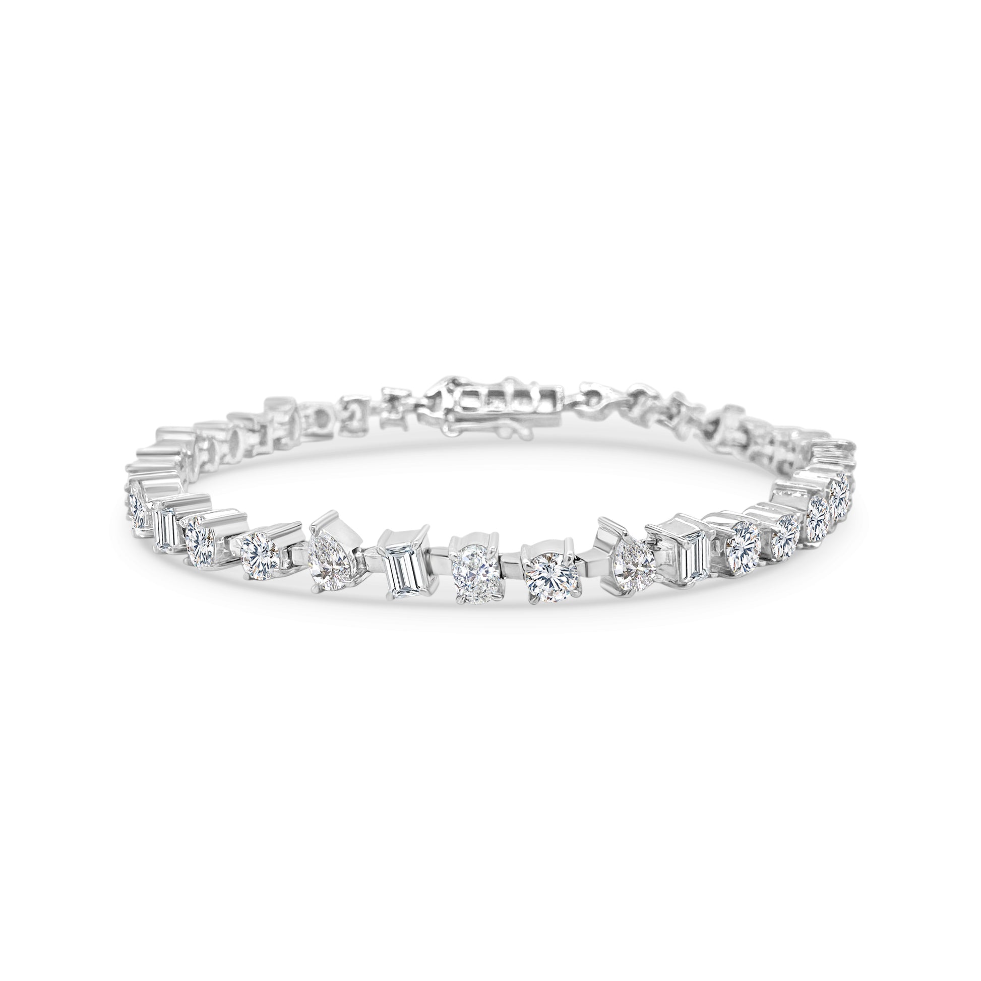 "Multi-Shaped Diamond Tennis Bracelet," "Diamond Tennis Bracelet," "Fine Jewelry," "Luxury Bracelet," "Fashion Bracelet," "Diamond Jewelry," "Sparkling Tennis Bracelet," "Statement Bracelet," "Elegant Jewelry," "Special Occasion Bracelet," "Multi-Cut Diamond Bracelet," "Timeless Jewelry," "Handcrafted Diamond Bracelet," "Versatile Diamond Bracelet," "Designer Tennis Bracelet."