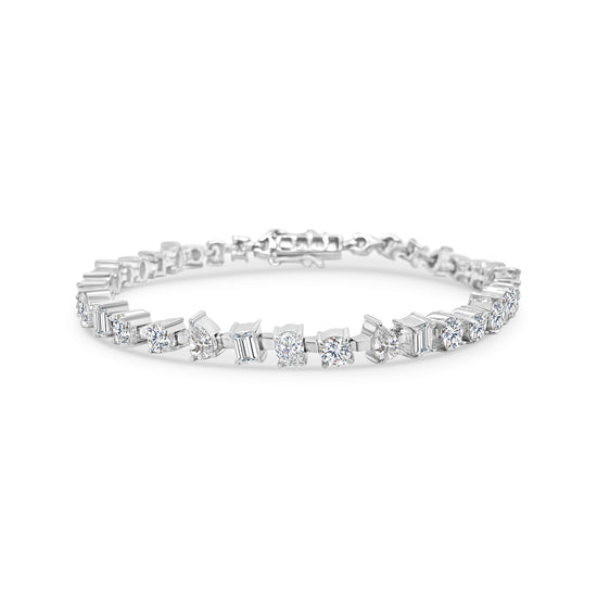 "Multi-Shaped Diamond Tennis Bracelet," "Diamond Tennis Bracelet," "Fine Jewelry," "Luxury Bracelet," "Fashion Bracelet," "Diamond Jewelry," "Sparkling Tennis Bracelet," "Statement Bracelet," "Elegant Jewelry," "Special Occasion Bracelet," "Multi-Cut Diamond Bracelet," "Timeless Jewelry," "Handcrafted Diamond Bracelet," "Versatile Diamond Bracelet," "Designer Tennis Bracelet."