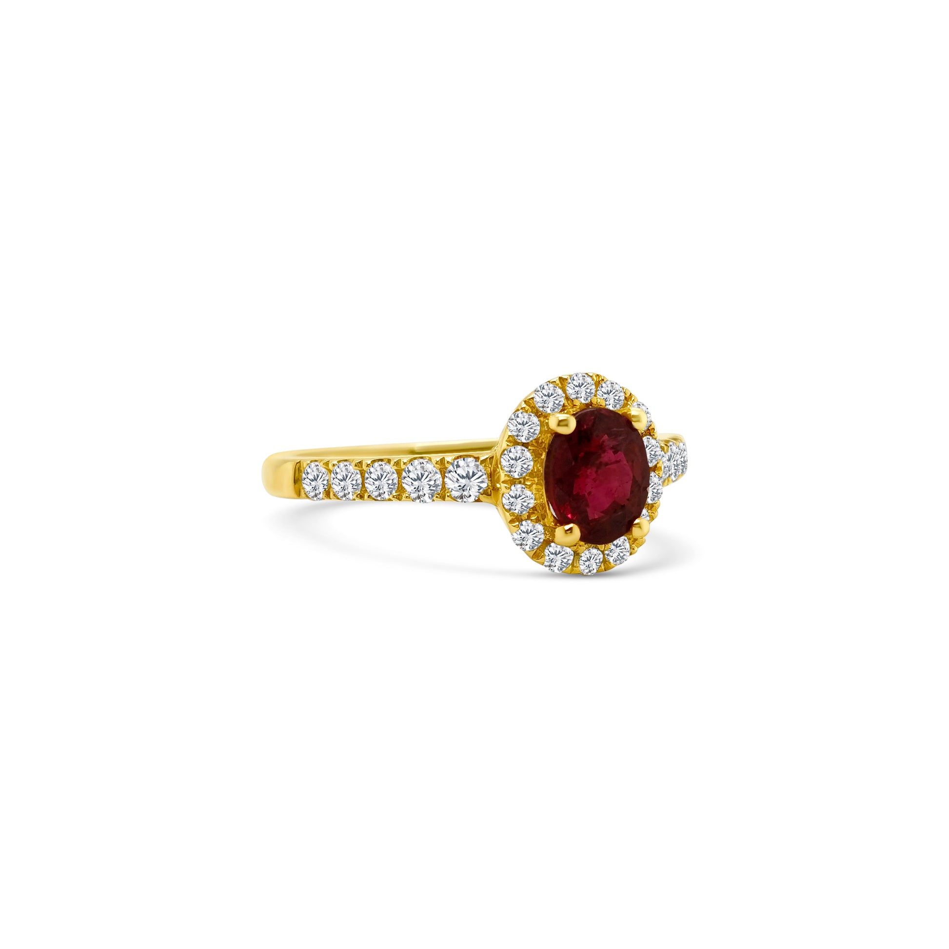 A stunning oval ruby center stone ring surrounded by a sparkling diamond halo, set in white gold, perfect for an elegant evening out or a glamorous event, jewelry that exudes luxury and sophistication, showcasing the timeless beauty of rubies and diamonds, a symbol of love, passion, and refinement.