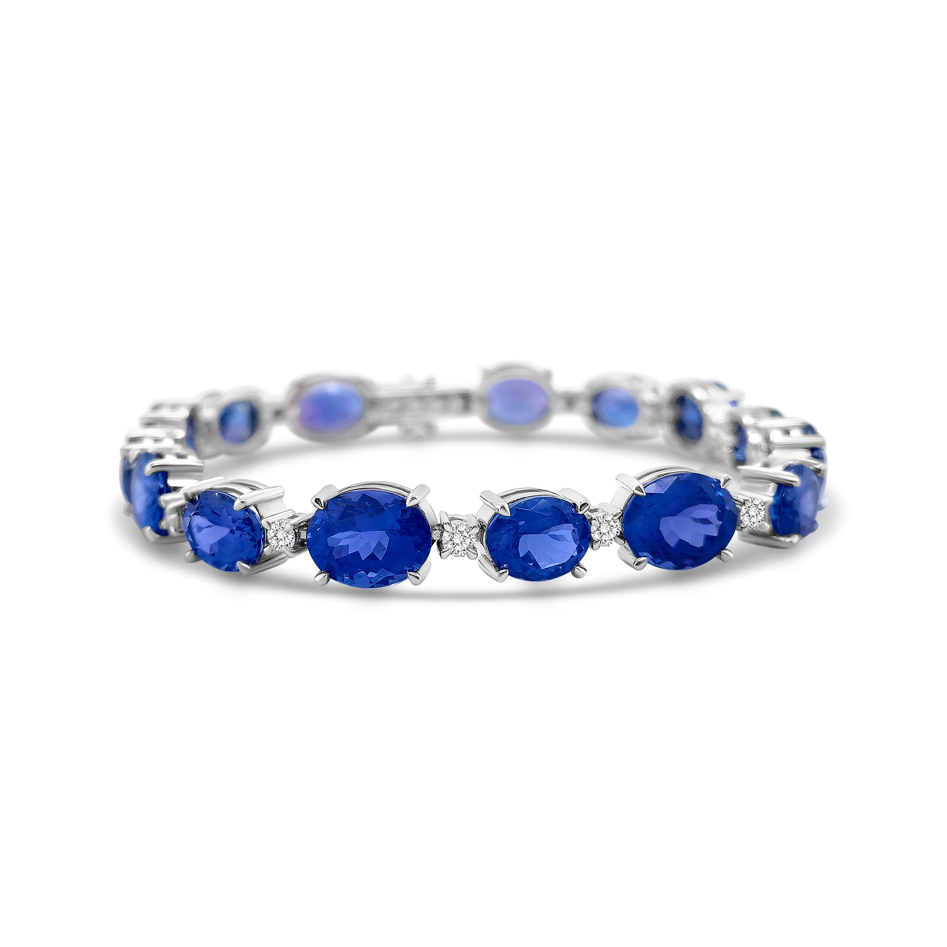 Oval Tanzanite & Diamond Bracelet, Tanzanite Bracelet, Diamond Bracelet, Oval Tanzanite Jewelry, Tanzanite and Diamond Bracelet, Gemstone Bracelet, Elegant Tanzanite Bracelet, Tanzanite Bracelet for Women, Fine Jewelry Bracelet, Luxury Tanzanite Bracelet, Tanzanite Gemstone Bracelet, Oval Tanzanite Gemstone, Tanzanite and Diamond Jewelry, Women's Tanzanite Bracelet, Tanzanite Bracelet with Diamonds.