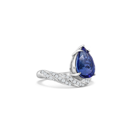 Pear Shape Tanzanite & Diamond Ring, Tanzanite Ring, Diamond Ring, Pear Shape Gemstone, Tanzanite Jewelry, Diamond Jewelry, Pear Shape Ring, Tanzanite and Diamond Design, Elegant Tanzanite Ring, Fine Jewelry Ring.