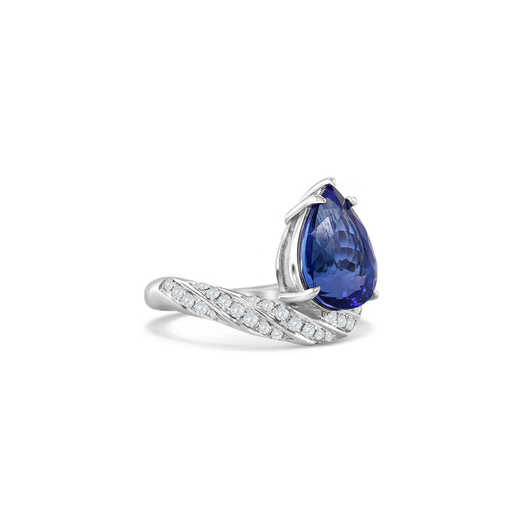 Pear Shape Tanzanite & Diamond Ring, Tanzanite Ring, Diamond Ring, Pear Shape Gemstone, Tanzanite Jewelry, Diamond Jewelry, Pear Shape Ring, Tanzanite and Diamond Design, Elegant Tanzanite Ring, Fine Jewelry Ring.