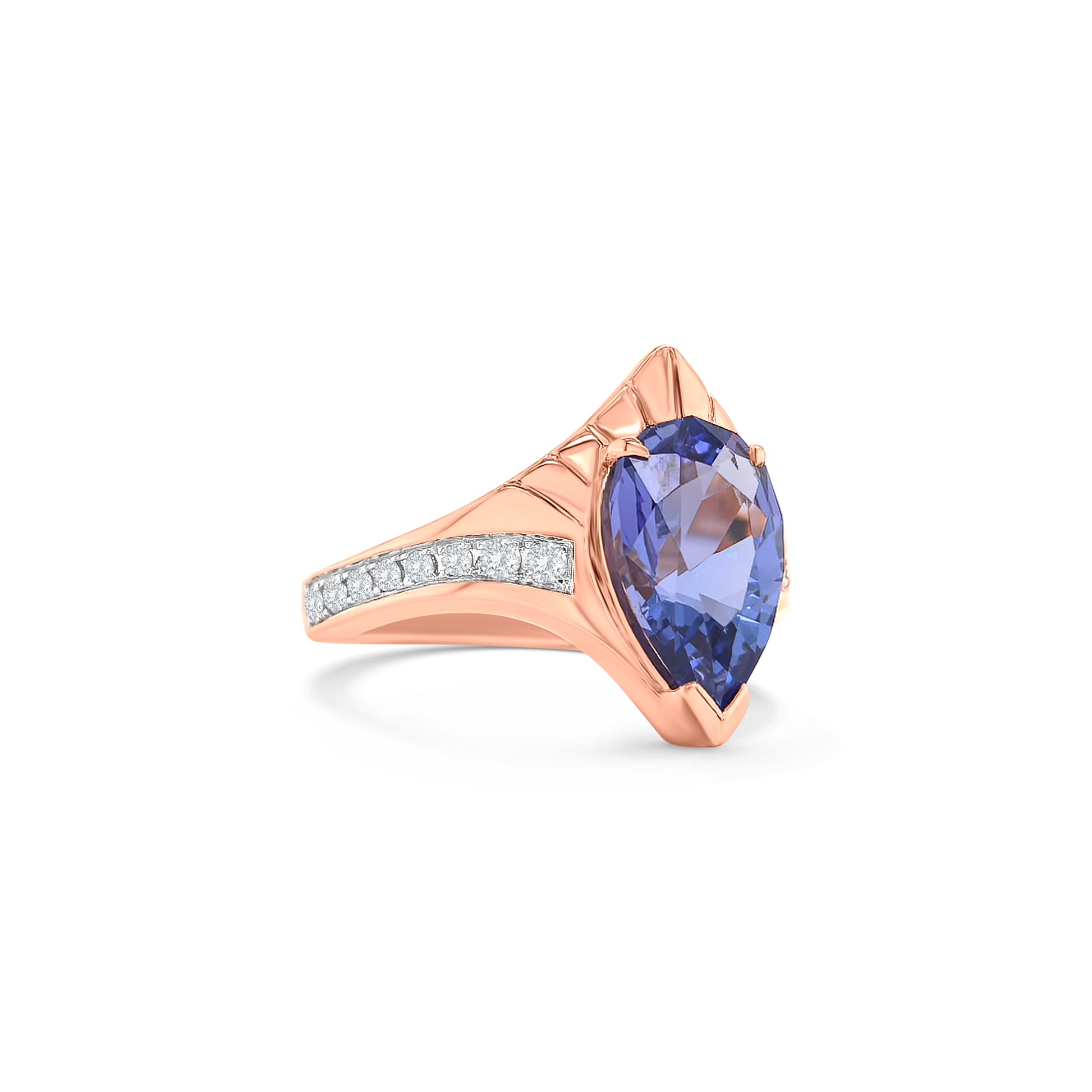 "Pear Shaped Tanzanite Ring, Tanzanite and Diamond Ring, Pear Cut Tanzanite Jewelry, Blue Gemstone Ring, Pear Shaped Engagement Ring, Tanzanite Ring with Diamonds, Pear Shaped Blue Stone Ring, Elegant Tanzanite Diamond Ring, Pear Shaped Tanzanite and Diamond Ring."