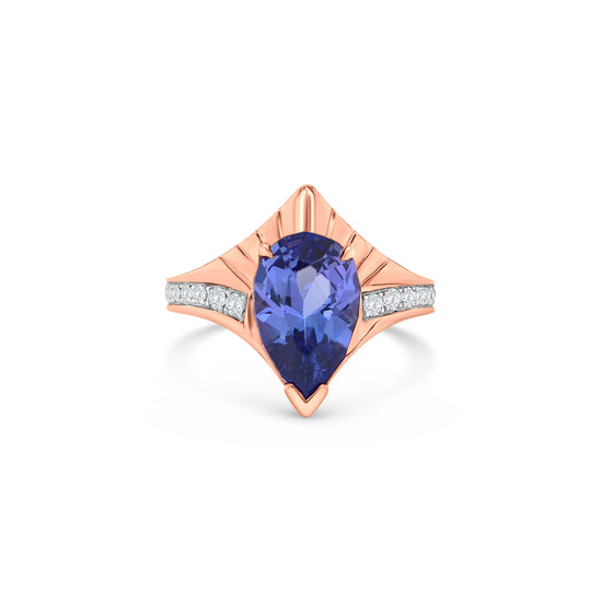 "Pear Shaped Tanzanite Ring, Tanzanite and Diamond Ring, Pear Cut Tanzanite Jewelry, Blue Gemstone Ring, Pear Shaped Engagement Ring, Tanzanite Ring with Diamonds, Pear Shaped Blue Stone Ring, Elegant Tanzanite Diamond Ring, Pear Shaped Tanzanite and Diamond Ring."