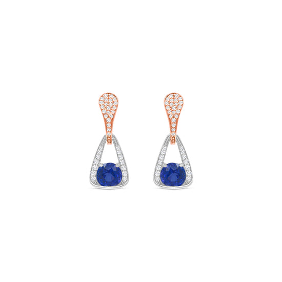 Elegant round tanzanite and diamond drop earrings in white gold, Close-up of sparkling tanzanite and diamond drop earrings, Luxury round tanzanite earrings with diamond accents, Women's tanzanite and diamond drop earrings, Fine jewelry round tanzanite and diamond drops, Handcrafted round tanzanite and diamond drop earrings