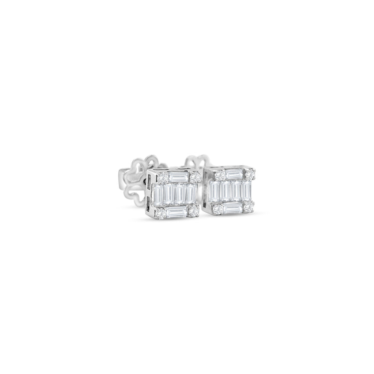 Luxurious stud earrings featuring baguette and round brilliant cut diamonds set in white gold, showcasing a modern and elegant design.