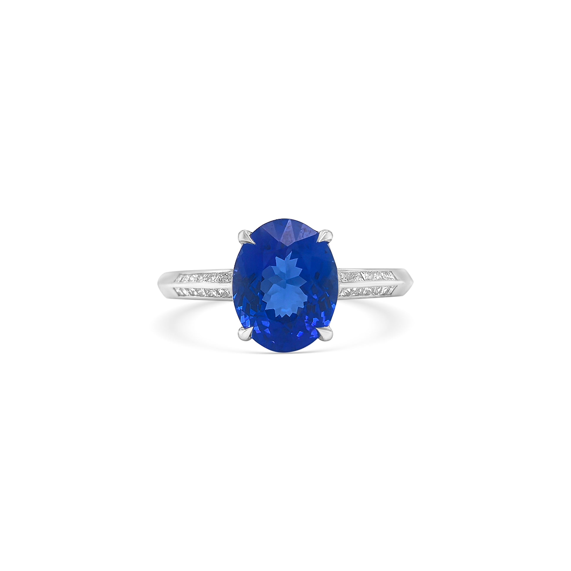 "Oval Cut Tanzanite & Diamond Ring," "Luxury Oval Tanzanite and Diamond Ring," "Elegant Oval Cut Tanzanite Diamond Engagement Ring," "Oval Tanzanite with Diamond Accents Ring," "Exquisite Oval Cut Tanzanite & Diamond Cocktail Ring," "Fine Jewelry Oval Cut Tanzanite and Diamond Ring," "Unique Oval Tanzanite and Diamond Ring Design," "Beautiful Oval Cut Tanzanite & Diamond Ring," "Timeless Oval Tanzanite and Diamond Ring," "Sparkling Oval Cut Tanzanite with Diamond Ring."