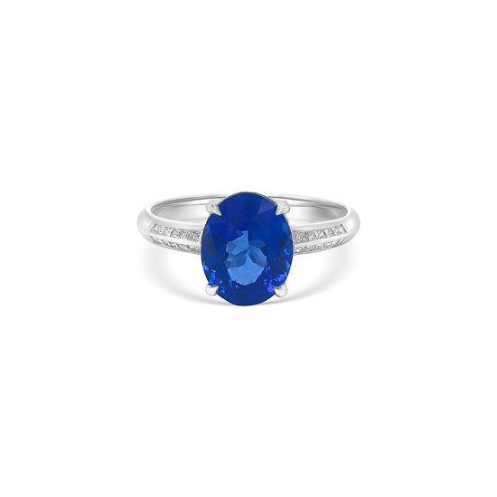 "Oval Cut Tanzanite & Diamond Ring," "Luxury Oval Tanzanite and Diamond Ring," "Elegant Oval Cut Tanzanite Diamond Engagement Ring," "Oval Tanzanite with Diamond Accents Ring," "Exquisite Oval Cut Tanzanite & Diamond Cocktail Ring," "Fine Jewelry Oval Cut Tanzanite and Diamond Ring," "Unique Oval Tanzanite and Diamond Ring Design," "Beautiful Oval Cut Tanzanite & Diamond Ring," "Timeless Oval Tanzanite and Diamond Ring," "Sparkling Oval Cut Tanzanite with Diamond Ring."