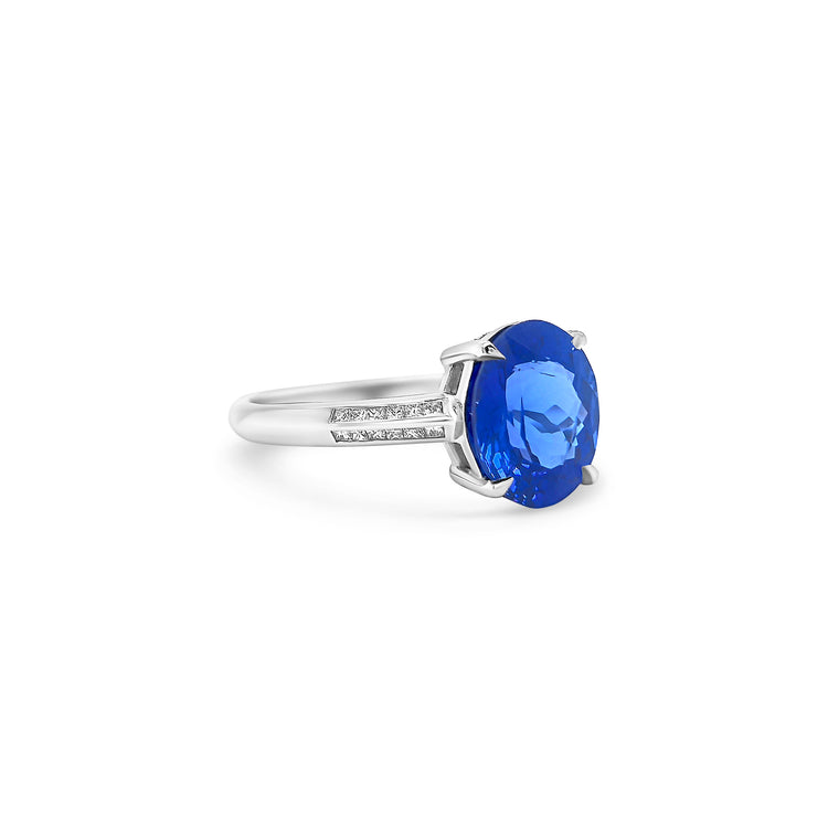 "Oval Cut Tanzanite & Diamond Ring," "Luxury Oval Tanzanite and Diamond Ring," "Elegant Oval Cut Tanzanite Diamond Engagement Ring," "Oval Tanzanite with Diamond Accents Ring," "Exquisite Oval Cut Tanzanite & Diamond Cocktail Ring," "Fine Jewelry Oval Cut Tanzanite and Diamond Ring," "Unique Oval Tanzanite and Diamond Ring Design," "Beautiful Oval Cut Tanzanite & Diamond Ring," "Timeless Oval Tanzanite and Diamond Ring," "Sparkling Oval Cut Tanzanite with Diamond Ring."