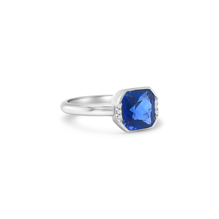 "Square Mixed Cut Tanzanite & Diamond Ring," "Luxury Square Cut Tanzanite and Diamond Ring," "Elegant Mixed Cut Tanzanite Diamond Engagement Ring," "Square Tanzanite and Diamond Cocktail Ring," "Exquisite Square Mixed Cut Tanzanite & Diamond Ring," "Fine Jewelry Square Tanzanite and Diamond Ring," "Unique Square Mixed Cut Tanzanite Diamond Ring," "Beautiful Square Cut Tanzanite with Diamond Accents," "Timeless Square Mixed Cut Tanzanite & Diamond Ring," "Sparkling Square Tanzanite and Diamond Ring."