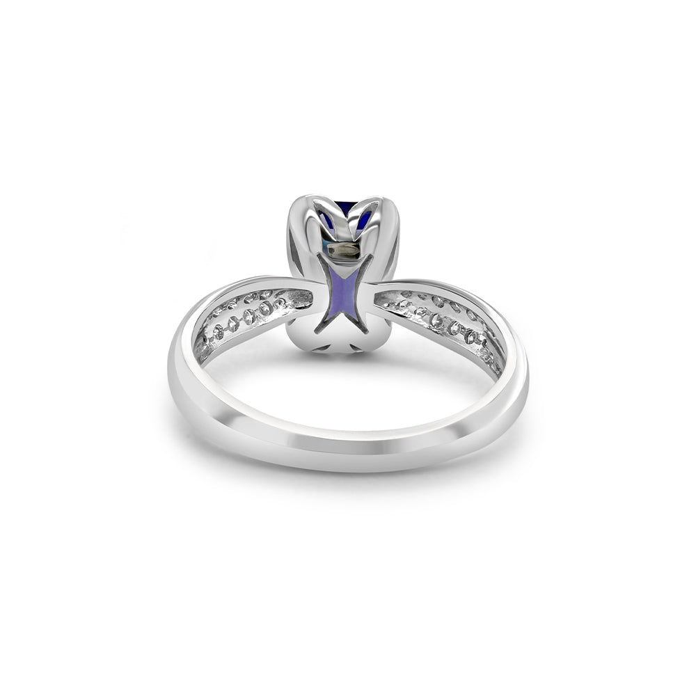 "Emerald Cut Tanzanite & Diamond Ring," "Exquisite Emerald Cut Tanzanite Engagement Ring," "Luxurious Tanzanite and Diamond Ring with Emerald Cut," "Elegant Emerald Cut Tanzanite Diamond Ring," "Fine Jewelry Emerald Cut Tanzanite with Diamonds," "High-Quality Tanzanite Emerald Cut Diamond Ring," "Statement Emerald Cut Tanzanite and Diamond Band," "Sparkling Emerald Cut Tanzanite and Diamond Ring," "Beautiful Emerald Cut Tanzanite Wedding Ring," "Fashionable Tanzanite Diamond Ring with Emerald Cut."