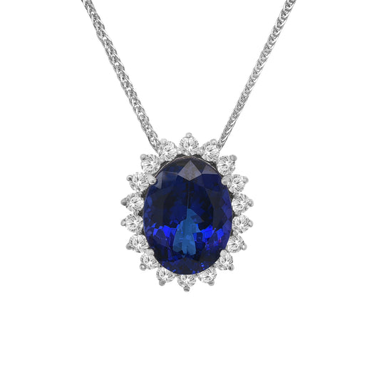 Discover elegance with this stunning pear-shaped tanzanite pendant surrounded by a sparkling floral diamond halo. A timeless luxury piece.