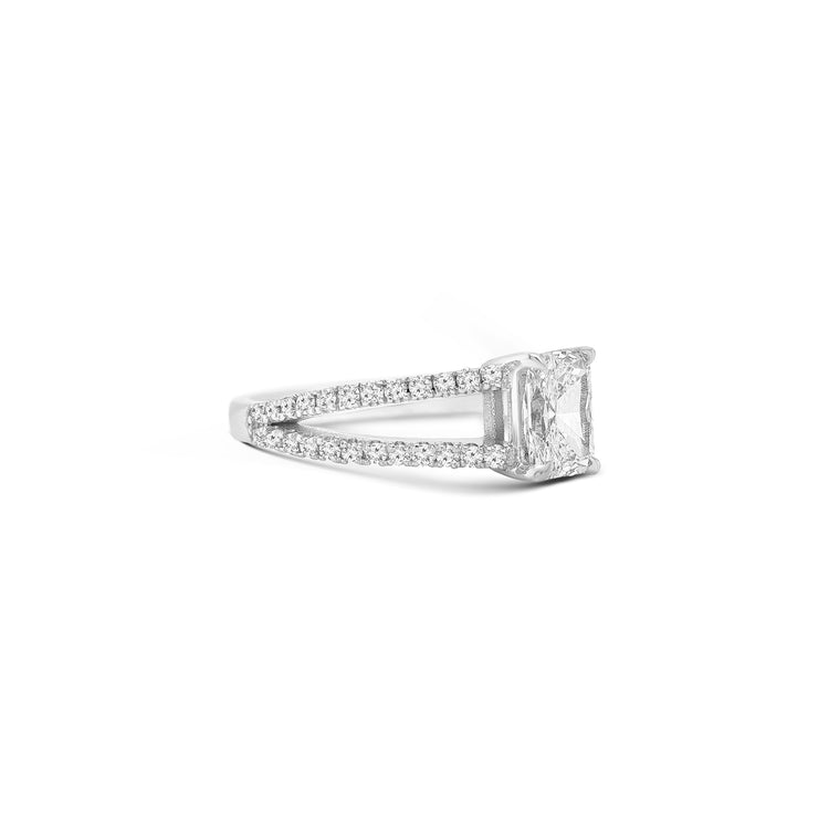 Split Shank Radiant Cut Diamond Ring showcases a mesmerizing center diamond, perfectly complemented by a delicate split shank band. Crafted for brilliance and elegance, this design symbolizes the beauty of commitment and forever.