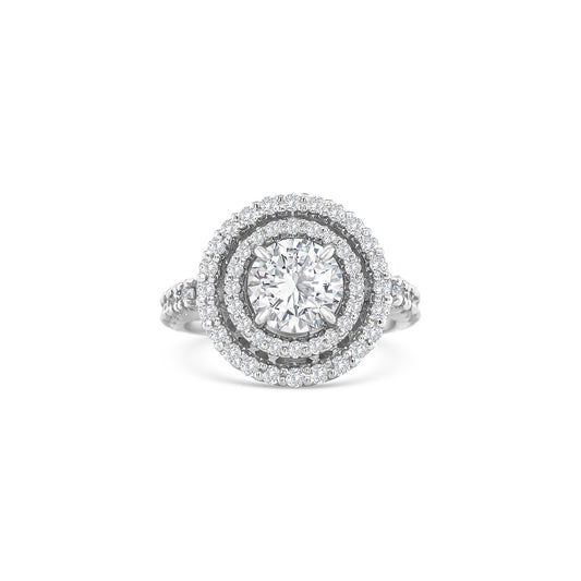 Round brilliant cut diamond ring with double halo setting, Elegant double halo ring featuring round brilliant diamond center, Luxury round diamond engagement ring with double halo design, White gold ring with round brilliant diamond and double halo, Sparkling round cut diamond ring with double halo of accent stones, Round brilliant engagement ring with intricate double halo, Classic round brilliant cut diamond ring in double halo setting