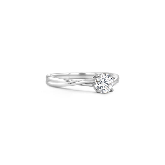 Solitaire round brilliant diamond ring, Classic solitaire engagement ring with round brilliant cut, Elegant round brilliant cut diamond solitaire in white gold, Timeless round diamond solitaire ring setting, Minimalist solitaire ring featuring round brilliant diamond, Round brilliant solitaire engagement ring in prong setting, Dainty round diamond solitaire ring for engagement or special occasions