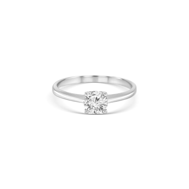 Solitaire round brilliant diamond ring, Classic solitaire engagement ring with round brilliant cut, Elegant round brilliant cut diamond solitaire in white gold, Timeless round diamond solitaire ring setting, Minimalist solitaire ring featuring round brilliant diamond, Round brilliant solitaire engagement ring in prong setting, Dainty round diamond solitaire ring for engagement or special occasions