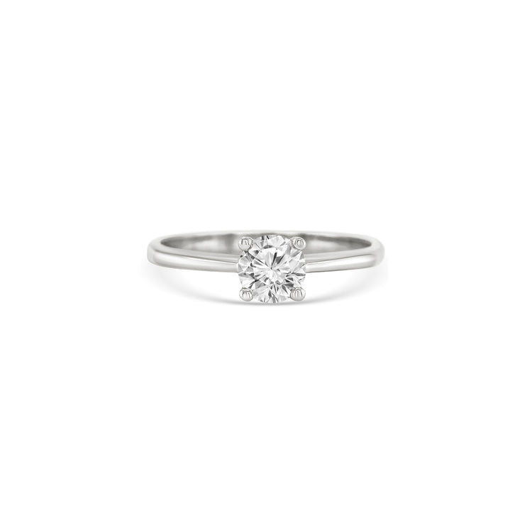 Solitaire round brilliant diamond ring, Classic solitaire engagement ring with round brilliant cut, Elegant round brilliant cut diamond solitaire in white gold, Timeless round diamond solitaire ring setting, Minimalist solitaire ring featuring round brilliant diamond, Round brilliant solitaire engagement ring in prong setting, Dainty round diamond solitaire ring for engagement or special occasions