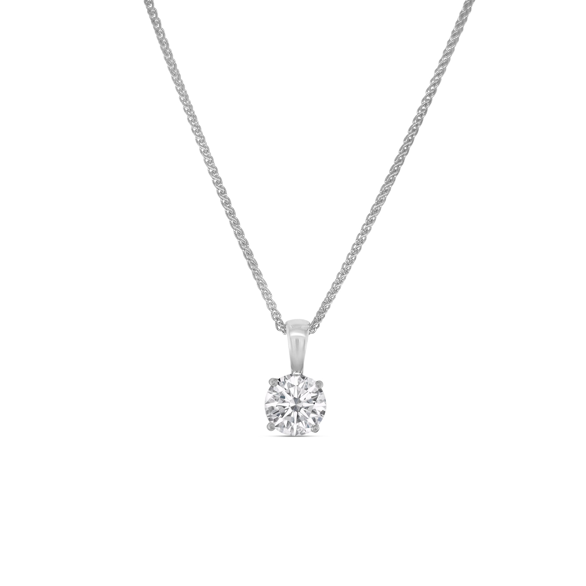 round brilliant diamond pendant, solitaire diamond necklace, classic diamond jewelry, round cut diamond pendant, elegant diamond pendant, fine jewelry necklace, timeless diamond pendant, white gold solitaire pendant, luxury diamond necklace, women’s diamond jewelry
