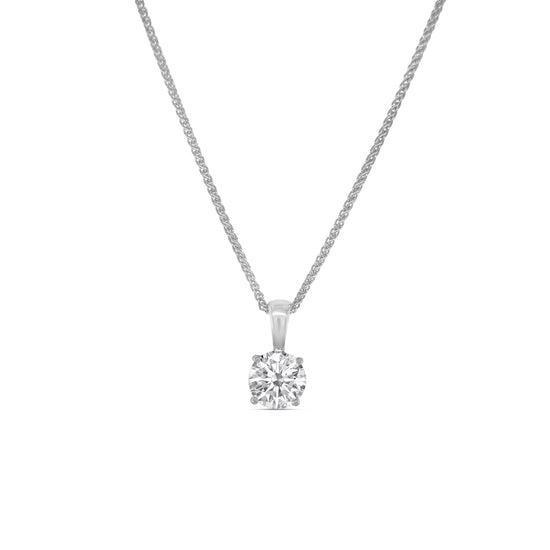 round brilliant diamond pendant, solitaire diamond necklace, classic diamond jewelry, round cut diamond pendant, elegant diamond pendant, fine jewelry necklace, timeless diamond pendant, white gold solitaire pendant, luxury diamond necklace, women’s diamond jewelry