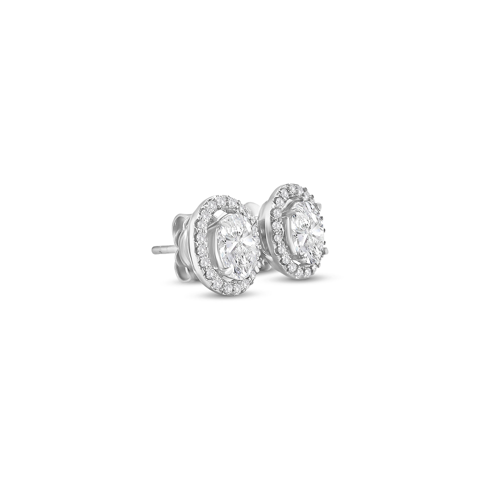 oval diamond halo earrings, diamond stud earrings, oval cut diamond jewelry, halo diamond earrings, elegant diamond studs, women’s fine jewelry, classic diamond earrings, oval halo stud earrings, luxury diamond jewelry, sparkling diamond earrings