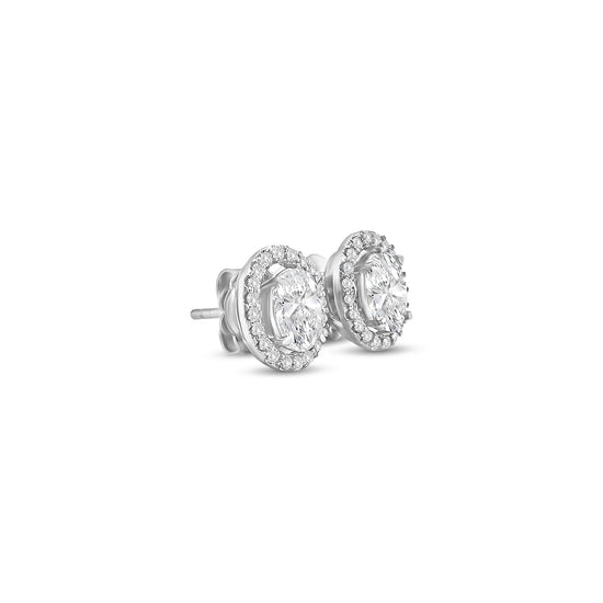 oval diamond halo earrings, diamond stud earrings, oval cut diamond jewelry, halo diamond earrings, elegant diamond studs, women’s fine jewelry, classic diamond earrings, oval halo stud earrings, luxury diamond jewelry, sparkling diamond earrings