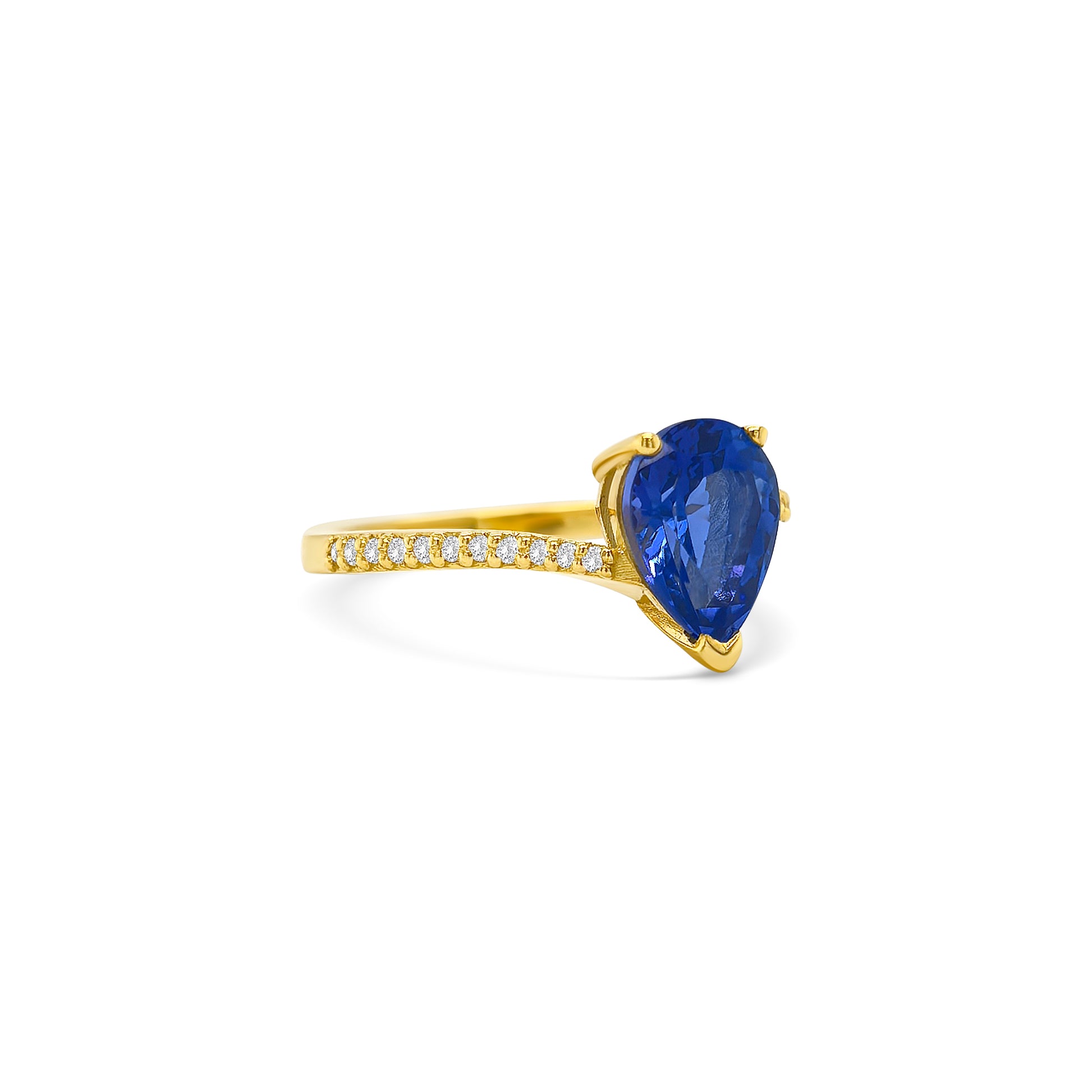 pear shape tanzanite ring, pear cut gemstone ring, tanzanite and diamond ring, elegant pear cut tanzanite jewelry, luxury gemstone ring, women’s tanzanite diamond ring, pear shaped engagement style ring, fine gemstone jewelry, white gold tanzanite and diamond ring, sparkling pear cut tanzanite ring