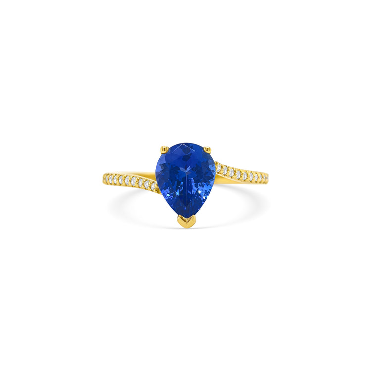 pear shape tanzanite ring, pear cut gemstone ring, tanzanite and diamond ring, elegant pear cut tanzanite jewelry, luxury gemstone ring, women’s tanzanite diamond ring, pear shaped engagement style ring, fine gemstone jewelry, white gold tanzanite and diamond ring, sparkling pear cut tanzanite ring