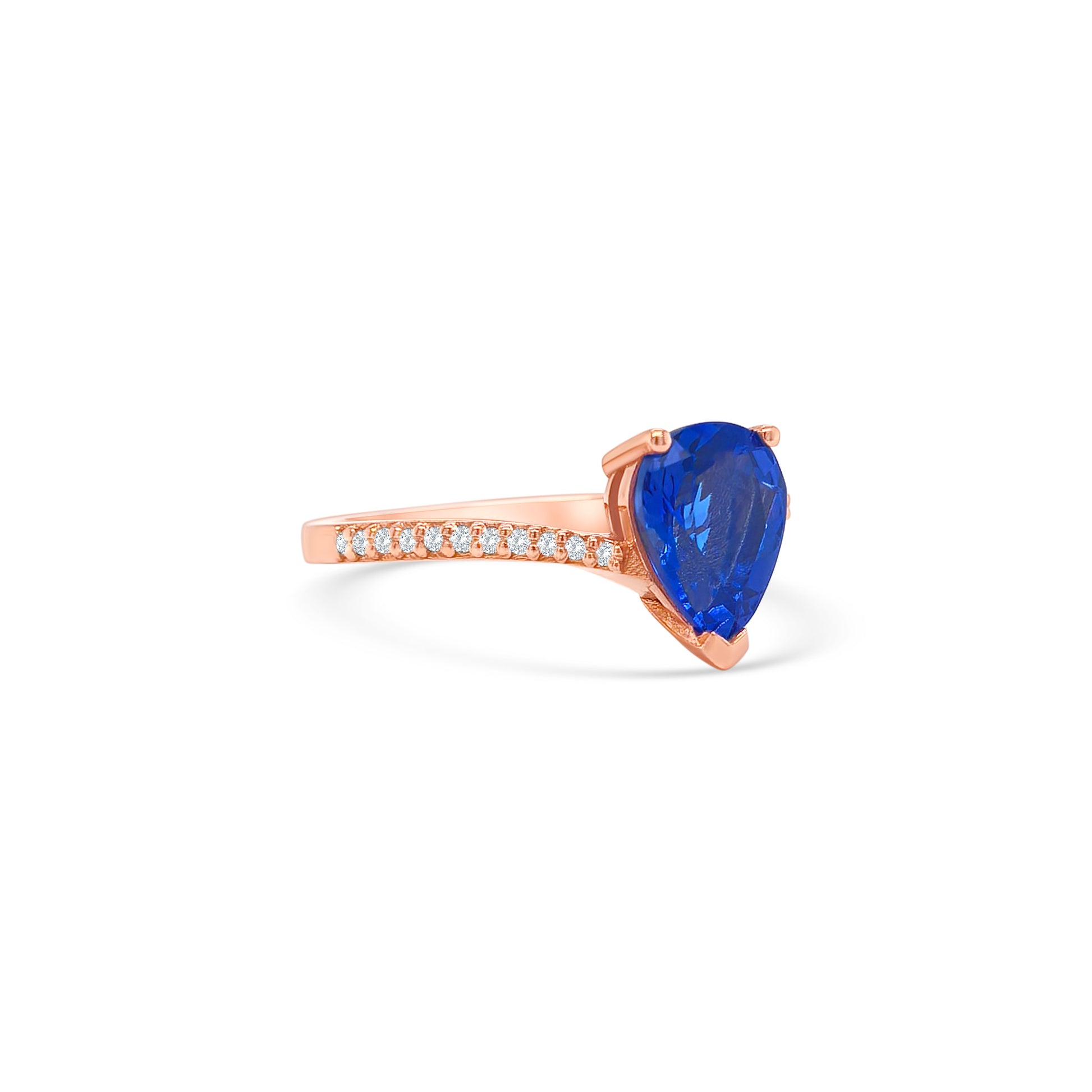 pear shape tanzanite ring, pear cut gemstone ring, tanzanite and diamond ring, elegant pear cut tanzanite jewelry, luxury gemstone ring, women’s tanzanite diamond ring, pear shaped engagement style ring, fine gemstone jewelry, white gold tanzanite and diamond ring, sparkling pear cut tanzanite ring