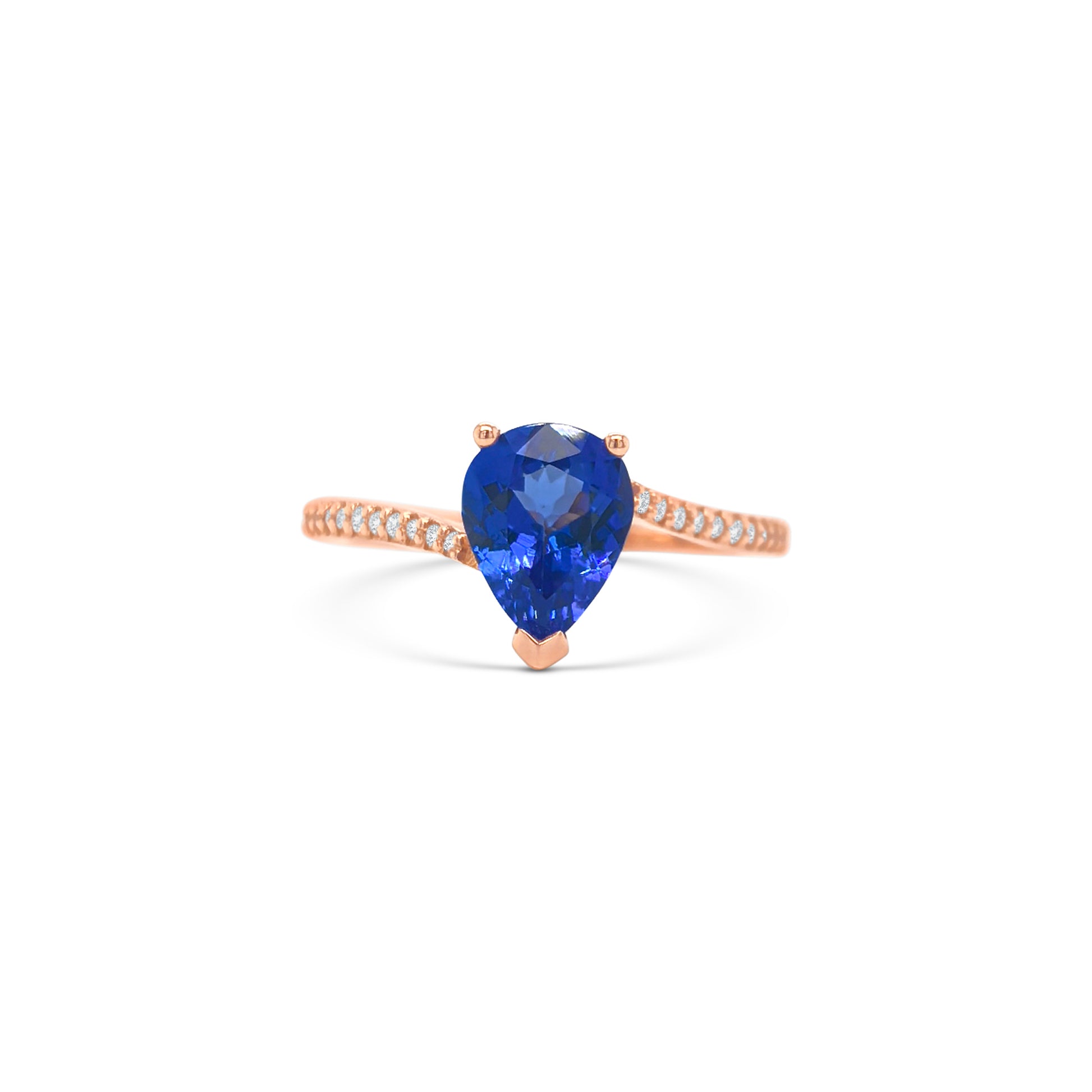 pear shape tanzanite ring, pear cut gemstone ring, tanzanite and diamond ring, elegant pear cut tanzanite jewelry, luxury gemstone ring, women’s tanzanite diamond ring, pear shaped engagement style ring, fine gemstone jewelry, white gold tanzanite and diamond ring, sparkling pear cut tanzanite ring