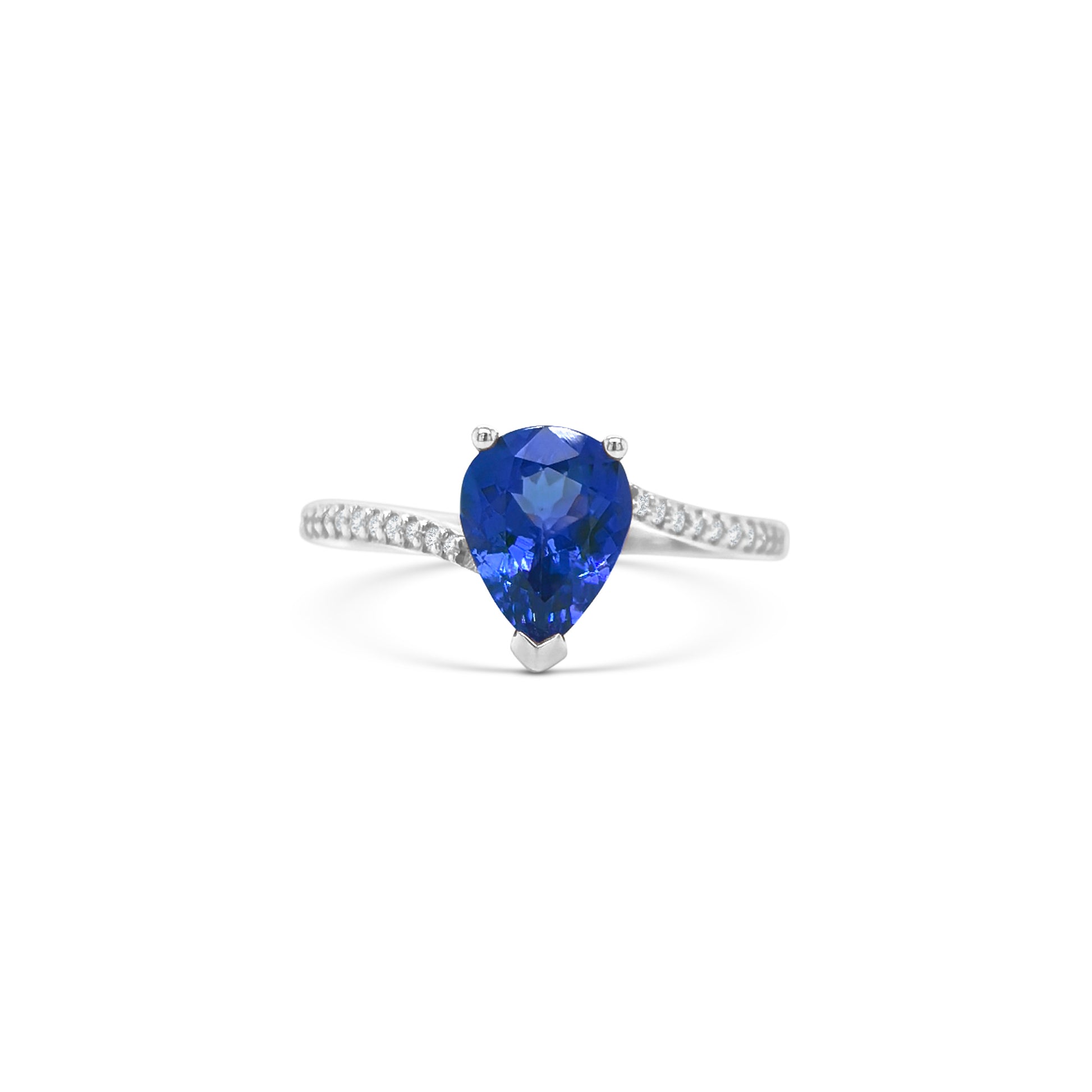 pear shape tanzanite ring, pear cut gemstone ring, tanzanite and diamond ring, elegant pear cut tanzanite jewelry, luxury gemstone ring, women’s tanzanite diamond ring, pear shaped engagement style ring, fine gemstone jewelry, white gold tanzanite and diamond ring, sparkling pear cut tanzanite ring
