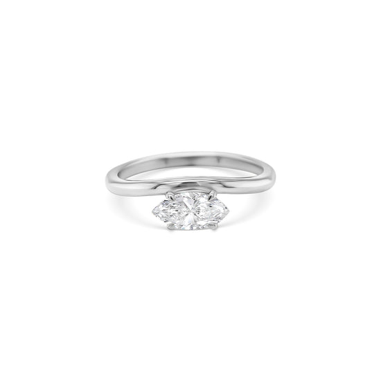 marquise cut diamond ring, solitaire diamond ring, white gold engagement ring, marquise diamond solitaire, white gold solitaire ring, minimalist diamond ring, elegant marquise ring, marquise diamond ring white gold, classic engagement ring, marquise cut white gold ring