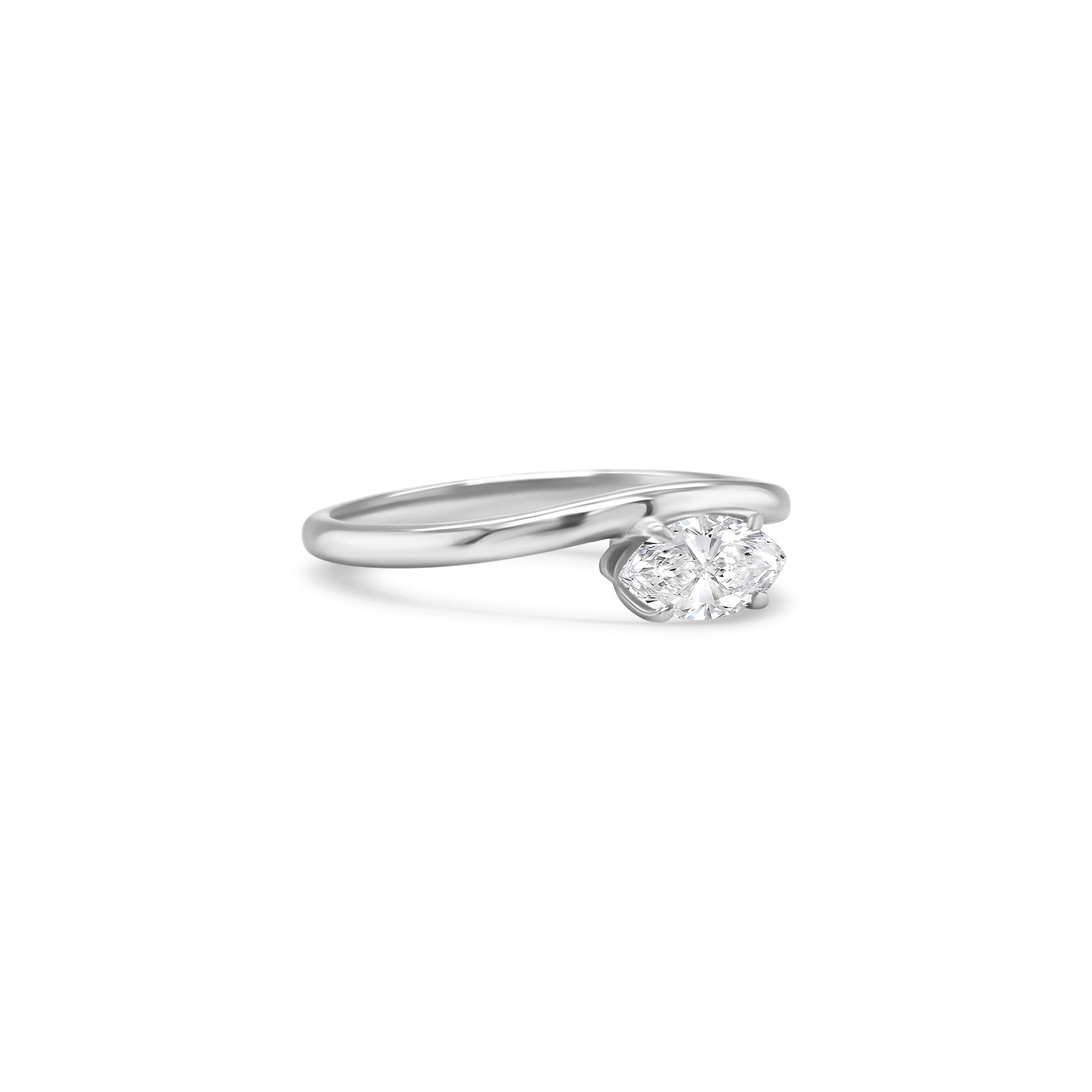marquise cut diamond ring, solitaire diamond ring, white gold engagement ring, marquise diamond solitaire, white gold solitaire ring, minimalist diamond ring, elegant marquise ring, marquise diamond ring white gold, classic engagement ring, marquise cut white gold ring